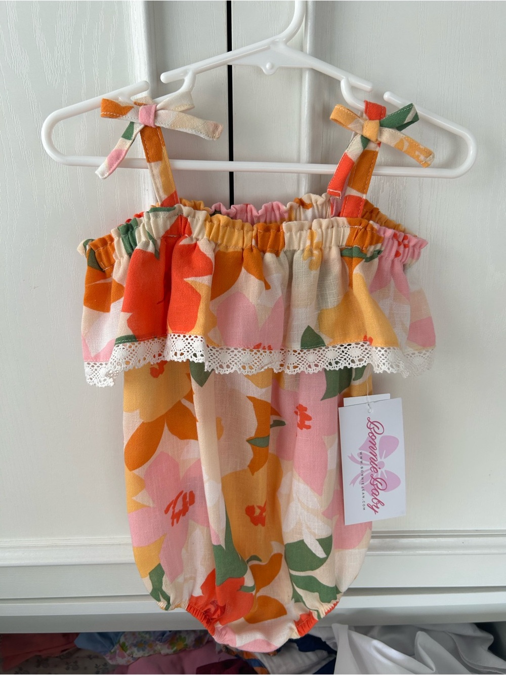 Bonnie Baby Floral Tie-Shoulder Bubble Romper in Pink/Orange